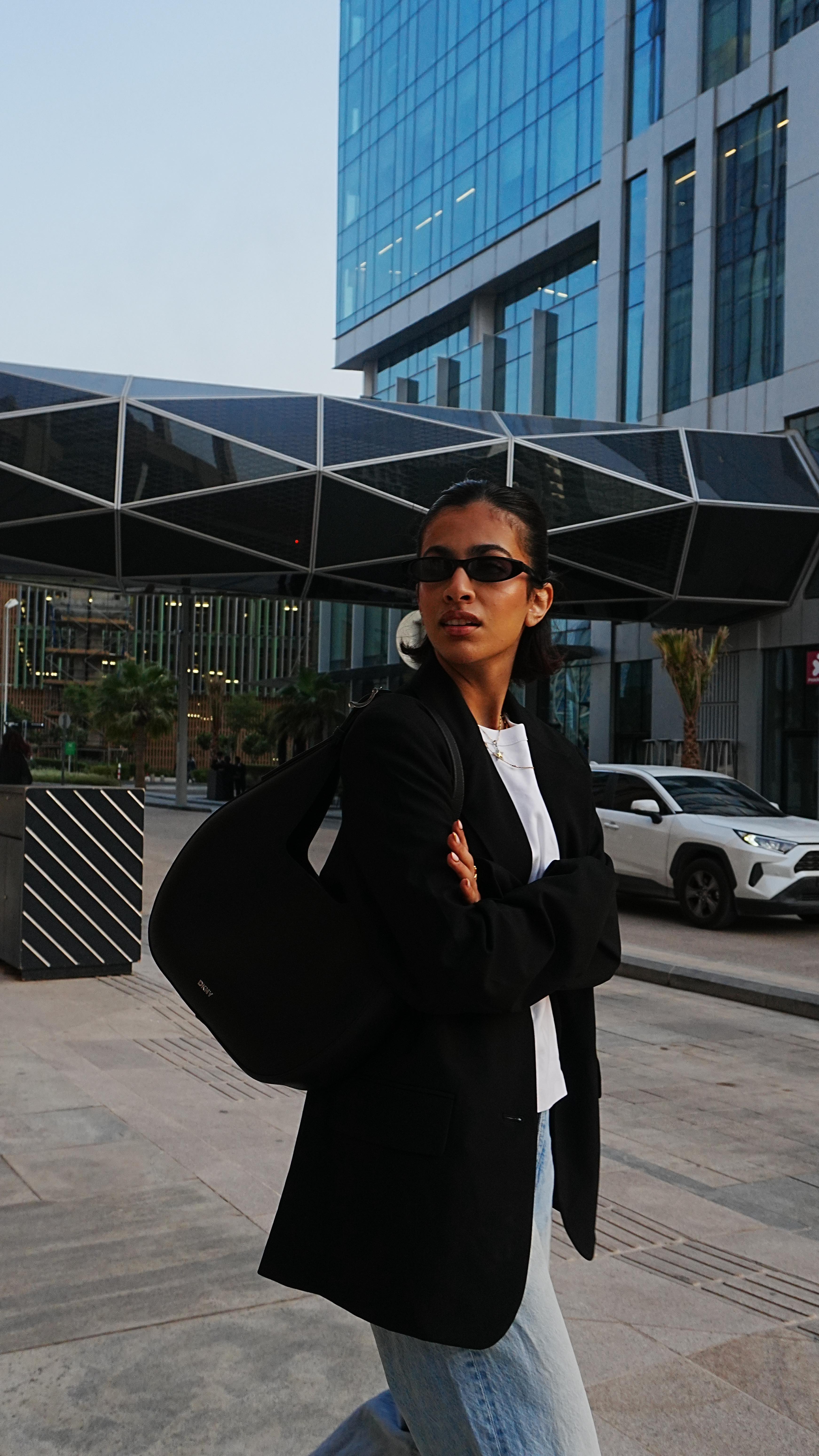 Instagram post by @daimgaw for DKNY. Caption reads: Fall season is coming and @dkny x @haileybieber....