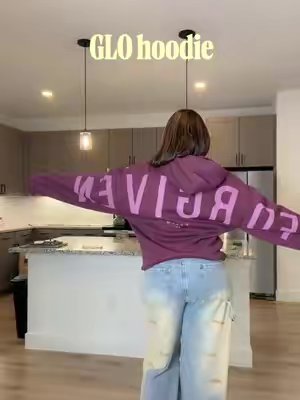TikTok post by @seyimii37 for God's Love Overcomes. Caption reads: [...] @God’s Love Overcomes #glohoodie....
