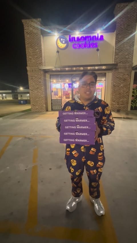Instagram post by @amirkhan82 for Insomnia Cookies. Caption reads: [...] with Championship Cookies! @insomniacookies....