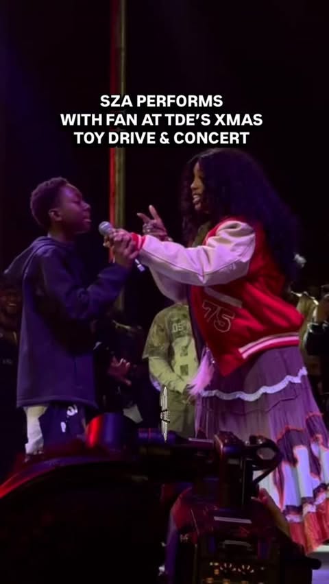 Instagram post by @bigboysneighborhood for iHeartRadio. Caption reads: @SZA at @TopDawgEnt’s annual Xmas Toy Drive &....