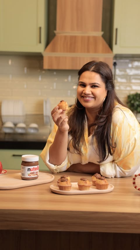 Instagram post by @poojadhingra for Nutella. Caption reads: This Nutella muffin is my every-year Christmas....