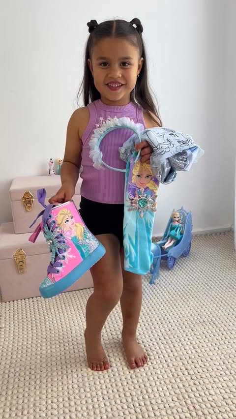 Instagram post by @mason.and.ella for MADMIA. Caption reads: [...] gorgeous new Elsa shoes and socks from....