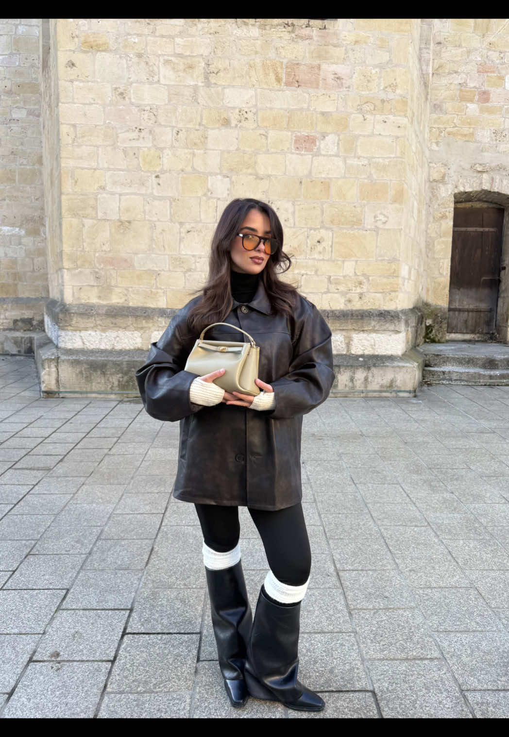 TikTok post by @kadouetso for JW PEI. Caption reads: Carmen bag 👝 Merci @JW PEI  *produit offert .