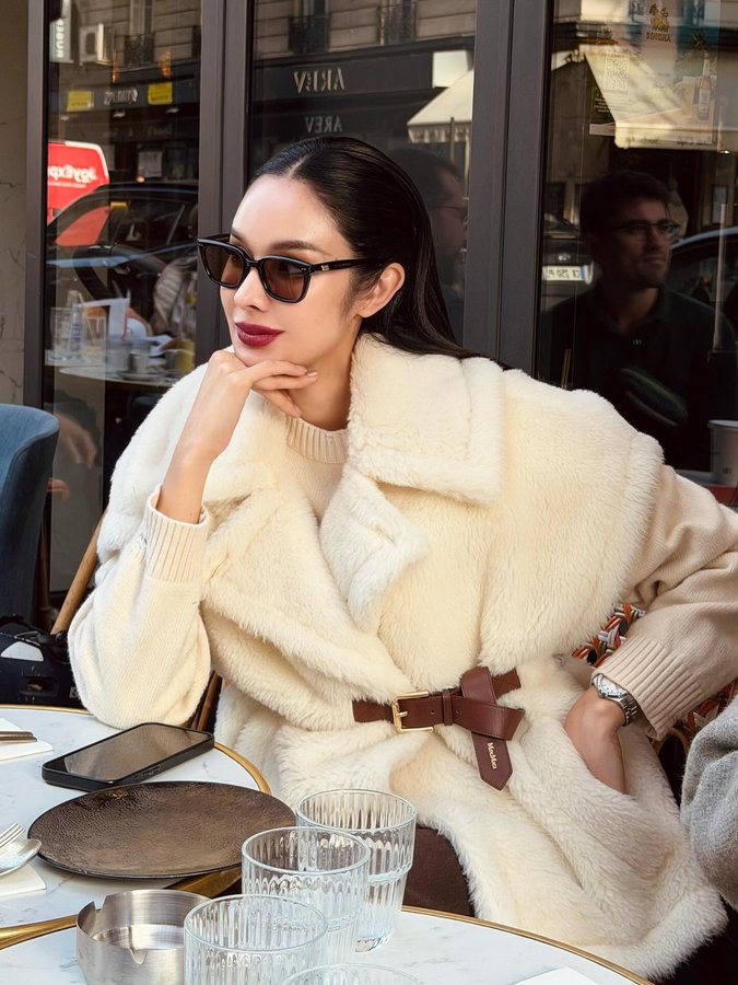 Instagram post by @yok_jittraphan for Max Mara. Caption reads: Paris never disappoints 🤎.