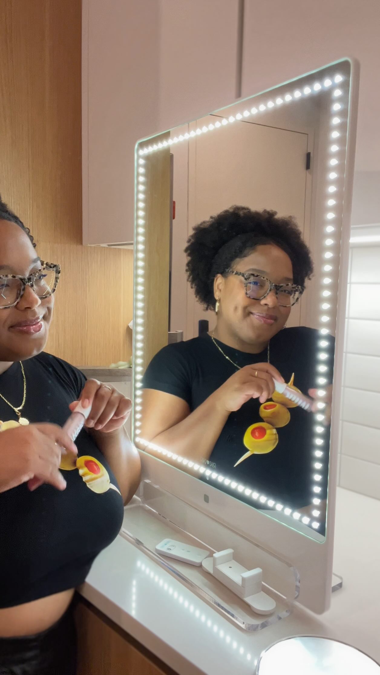 Instagram post by @ohheyroxanne for RIKI LOVES RIKI. Caption reads: The best vanity mirror everyone’s been gatekeeping....