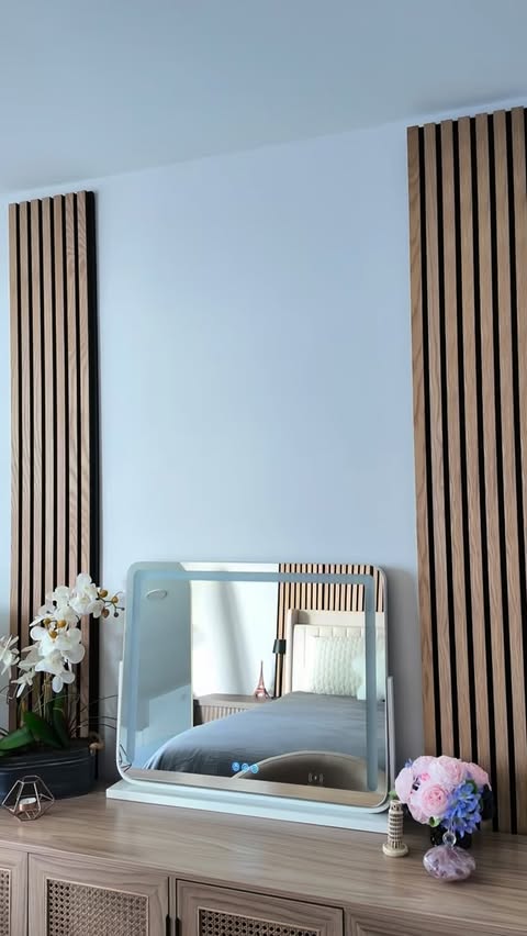 Instagram post by @itssomiamii for Yitahome. Caption reads: @yitahome.us lighted mirror adds a fresh, airy....