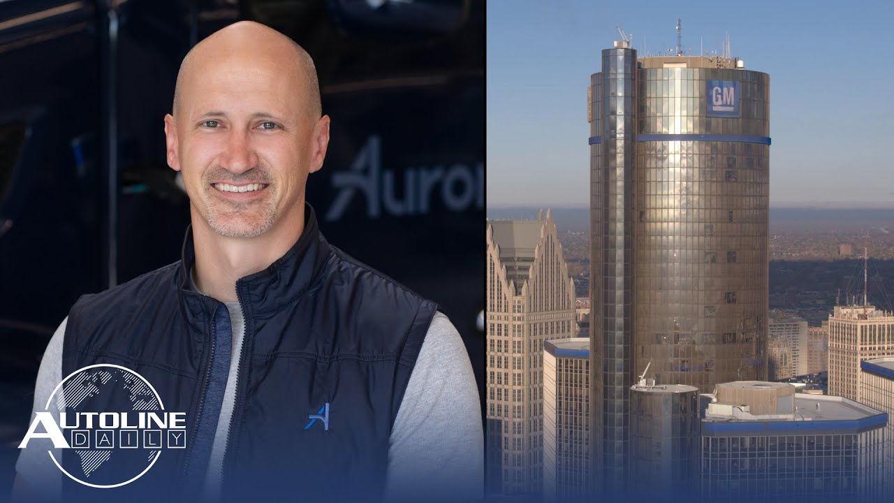 YouTube post by @AutolineDetroit for Bloomberg. Caption reads: He Could Be GM's Next CEO; The Battle Over....