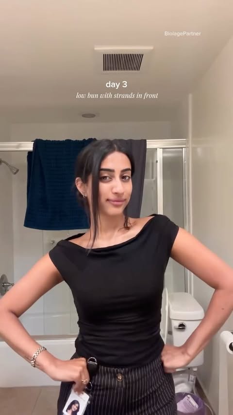 Instagram post by @neha.dharma for Biolage. Caption reads: [...] to avoid over-washing my hair💆🏾‍♀️....