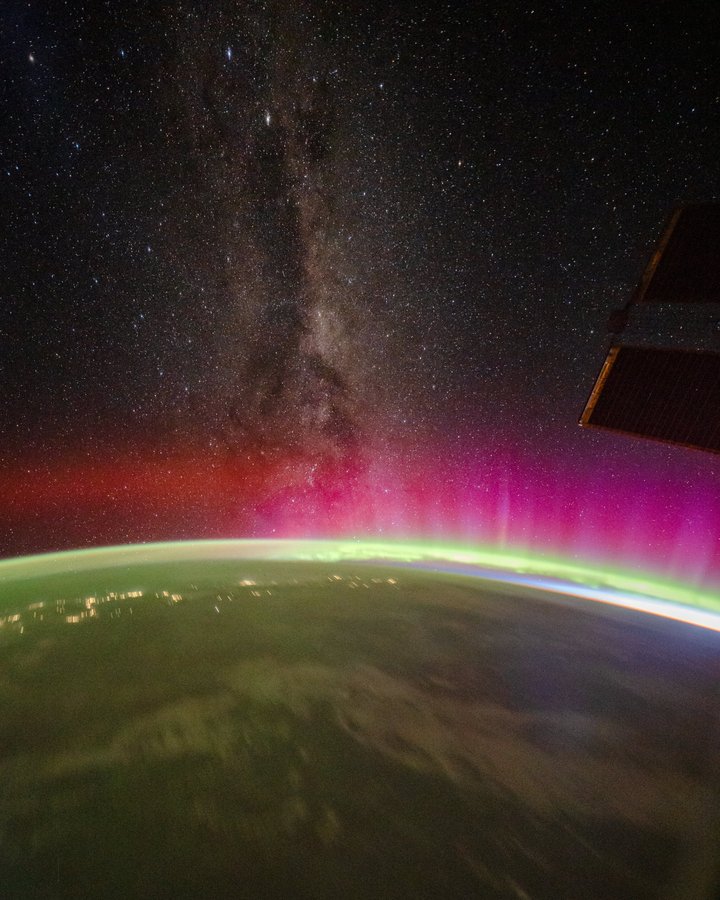 Instagram post by @astro_pettit for NASA. Caption reads: Auroras meeting the Milky Way galaxy..