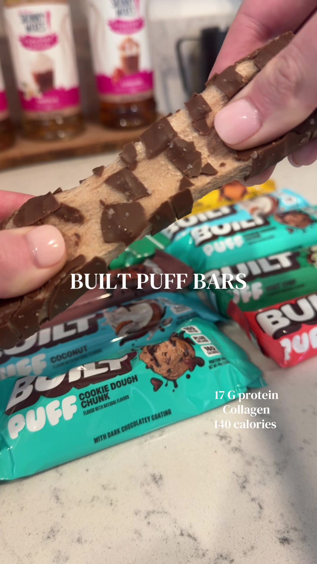 TikTok post by @michaelaandbronny for BUILT Bar. Caption reads: [...] obsessed @BUILT.BAR 👏🏻😍 #proteinbar....