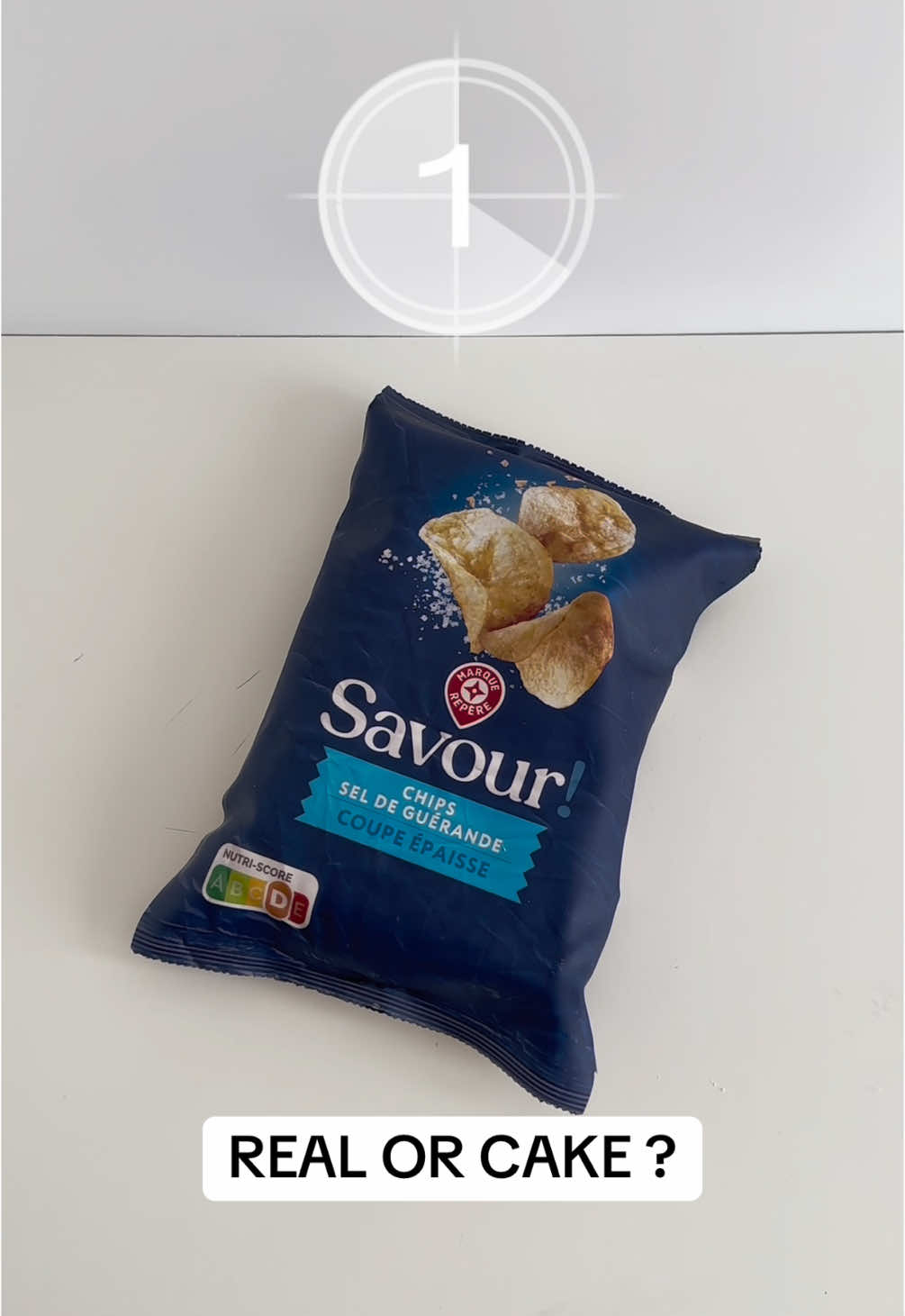 TikTok post by @celine_cakedesign45 for E.Leclerc. Caption reads: Real or cake 🍰? Marque repère @E.Leclerc  What....