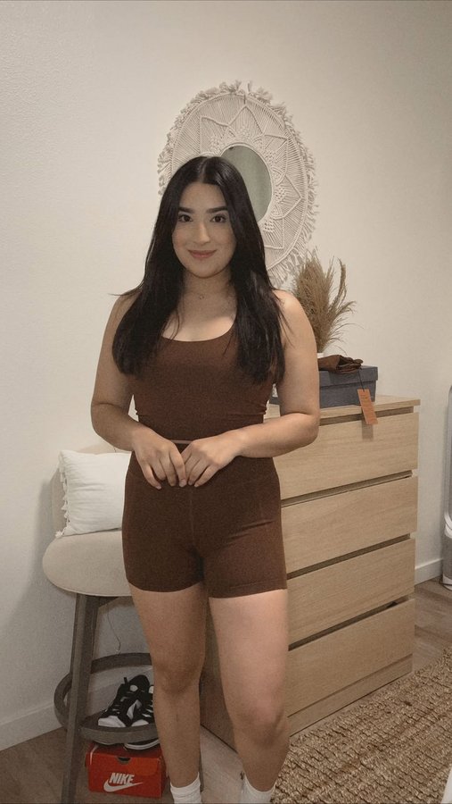 Instagram post by @lafashionmom for Girlfriend Collective. Caption reads: Wearing my cute brown set from @girlfriend 
Use....