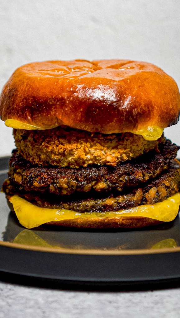 Instagram post by @thisguycooks for Violife Foods. Caption reads: KELP BURGER W/ TAHINI HARISSA KETCHUP — A....