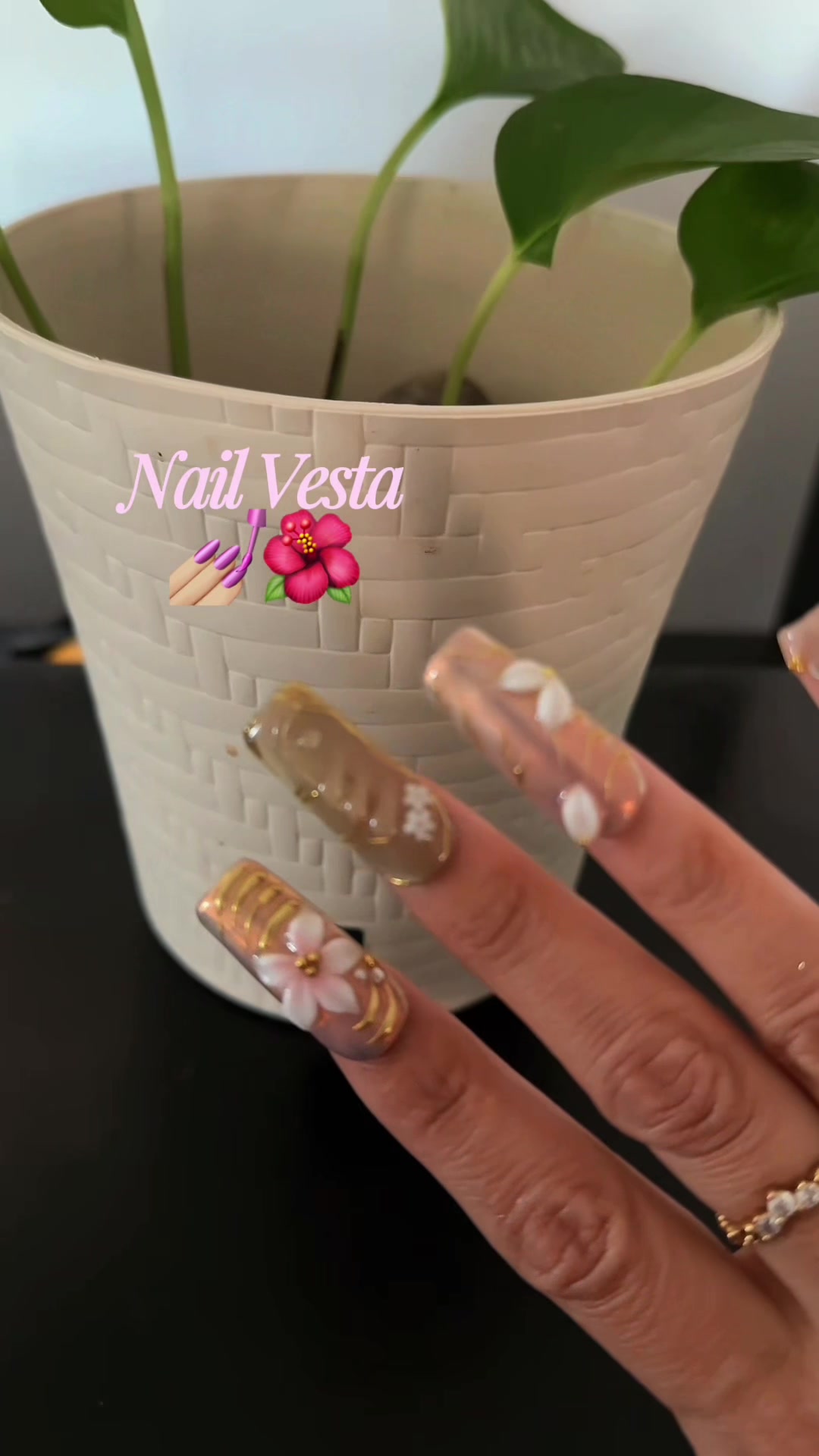 TikTok post by @itssjayy.xoxo for Nailvesta. Caption reads: Nails in minutes nails💅🏼 @NailVesta 🤎....