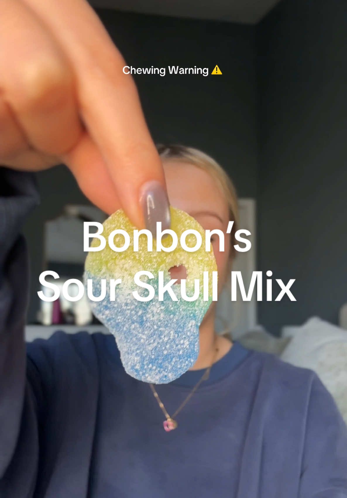 TikTok post by @abigailfeehls for BonBon NYC. Caption reads: omg! A place to get ALL sour skulls!!! Thank you....
