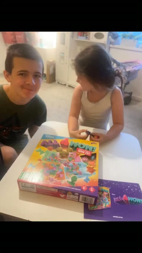 Instagram post by @autismlifeadventures for TOMY. Caption reads: All 4 won game by @gamesbytomy @drumondpark Ad The....