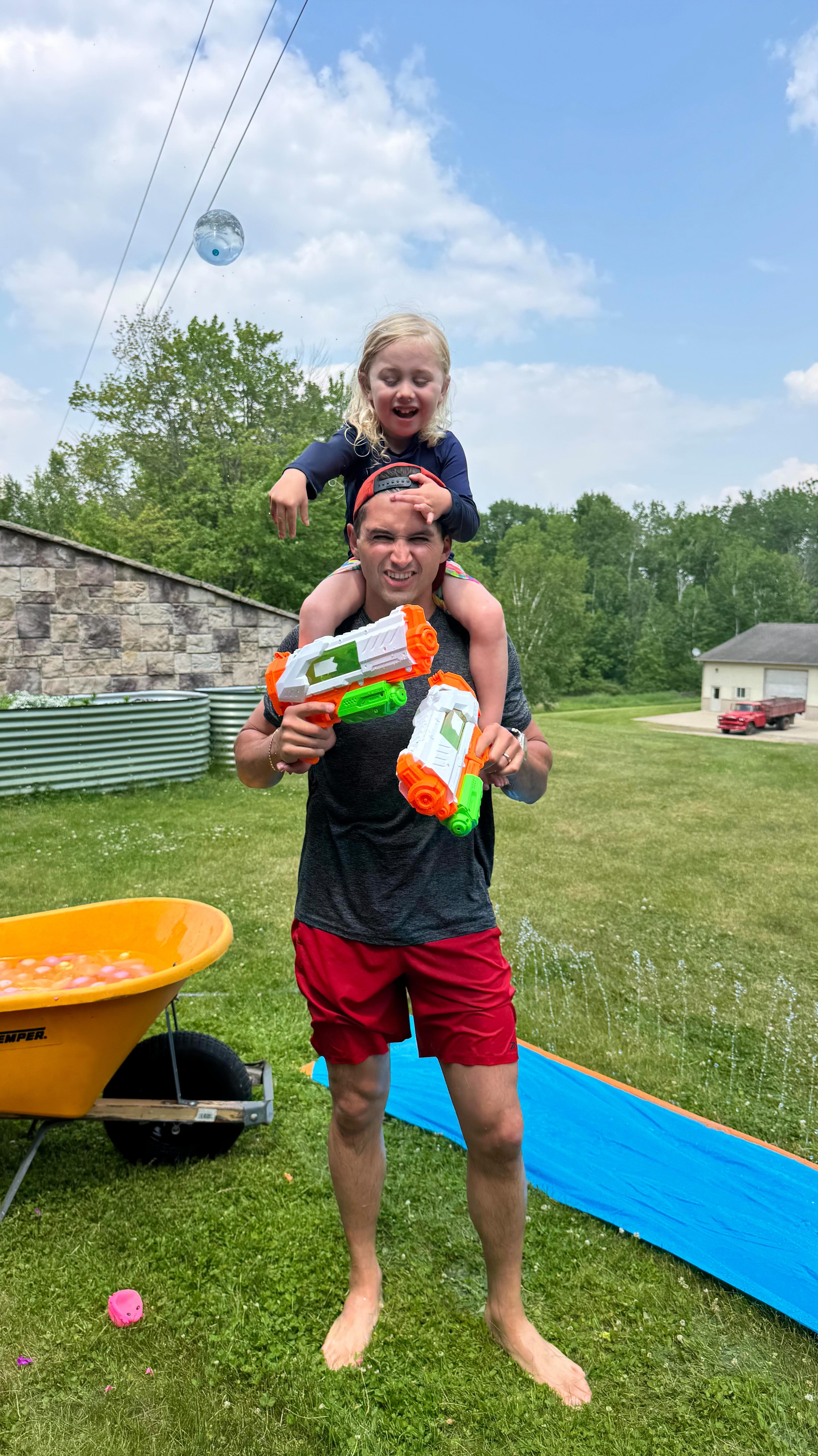 Instagram post by @elfitvic for Liquid IV. Caption reads: It’s me vs. my 3-year-old in an all-out backyard....
