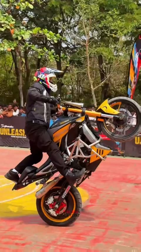 Instagram post by @machi_salem_da for TVS Motor Company. Caption reads: 🔥 Live Stunt by Experts Unveiling of TVS Apache....