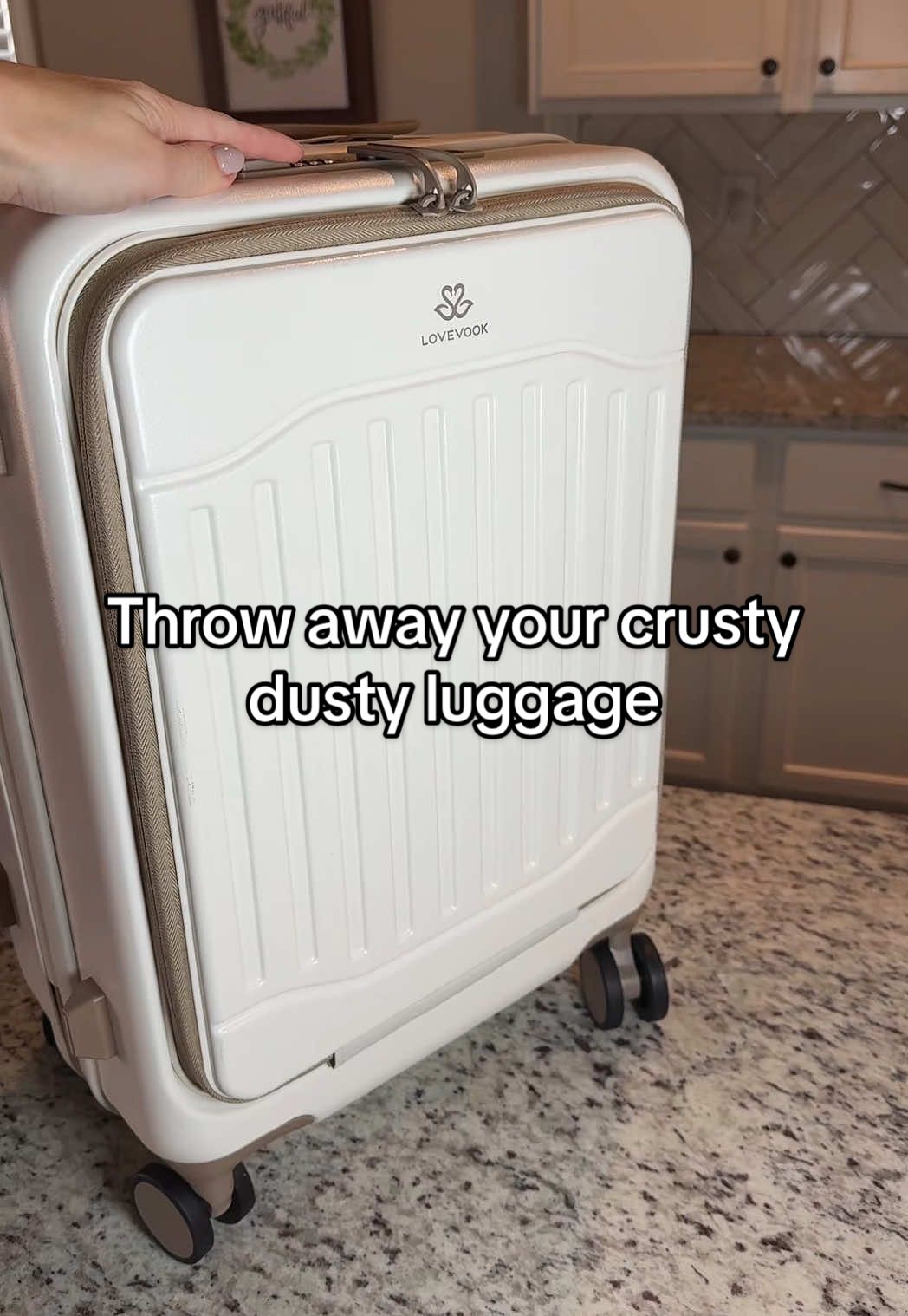 TikTok post by @its_ashley_j for Lovevook. Caption reads: [...] gone!!  #carryonluggage #TSAapproved....