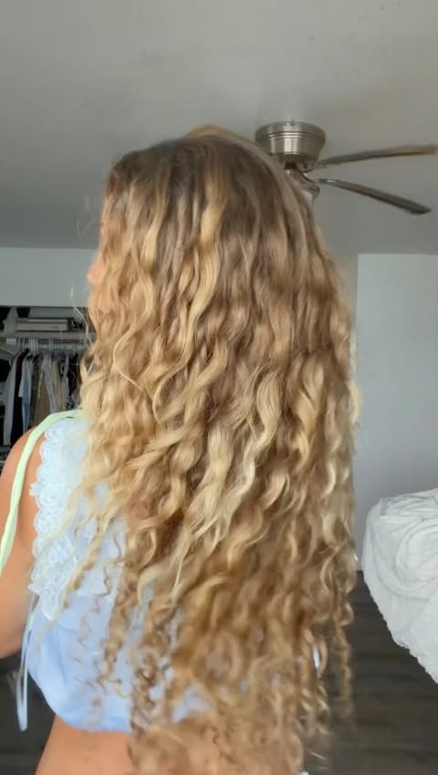 Instagram post by @emerythueson for Conair. Caption reads: [...] love a Curl defining brush & this from....