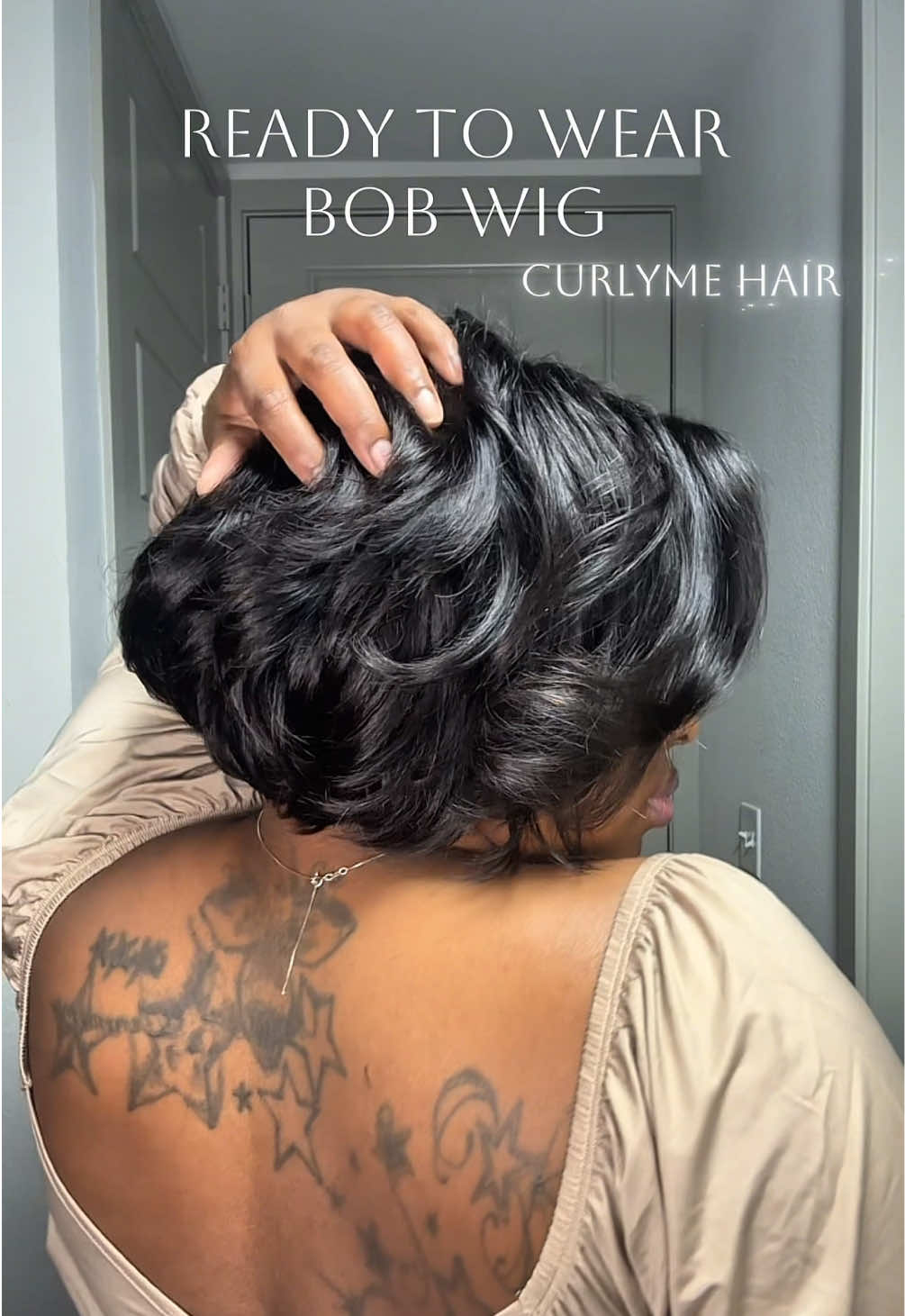 TikTok post by @stylisttraceyshenise for Curlyme. Caption reads: [...] layered bob is EVERYTHING! @CurlyMe Hair....
