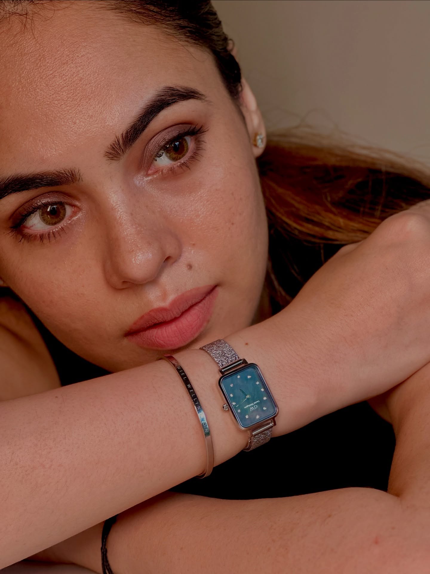 Instagram post by @malobika_m.j for Daniel Wellington. Caption reads: The kind of accessory your wrist deserves.....