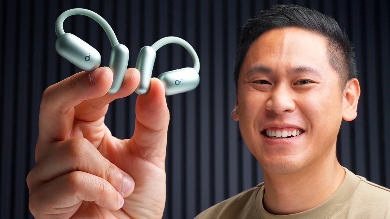 YouTube post by @ThisIsTechToday for The Wood Veneer Hub. Caption reads: Must Have Open-Ear Headphones are for Traveling:....