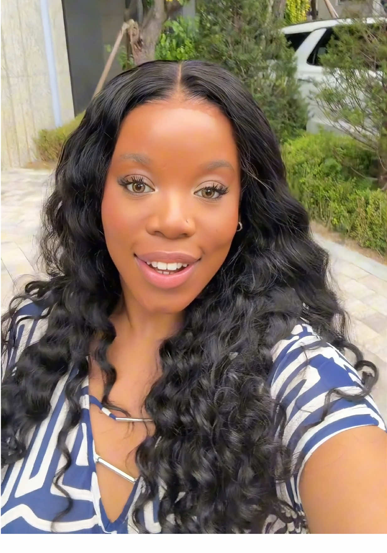 TikTok post by @lithakazimeyilechoi for Wiggins Hair. Caption reads: I love me some @WIGGINS__HAIR 🥰 #fyp #bouncycurls....