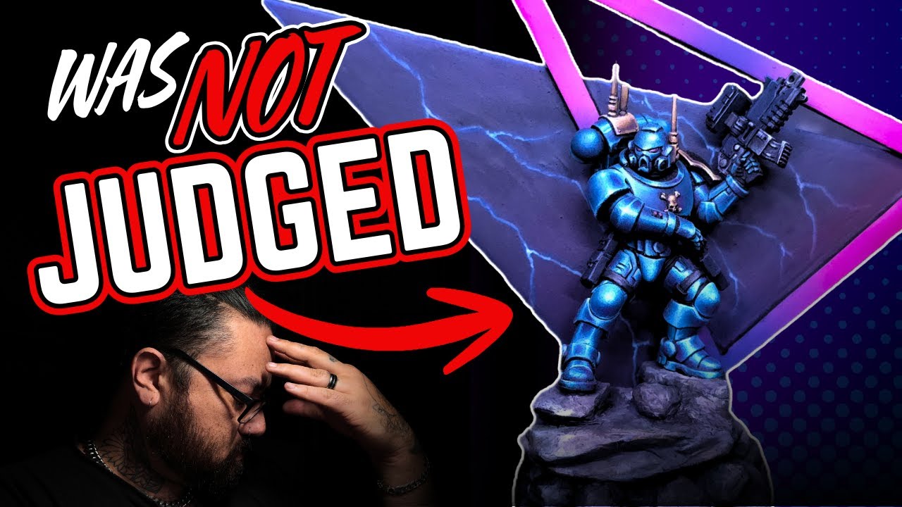 YouTube post by @heresyforheretics for The Army Painter. Caption reads: [...] artist Paints used in this video....