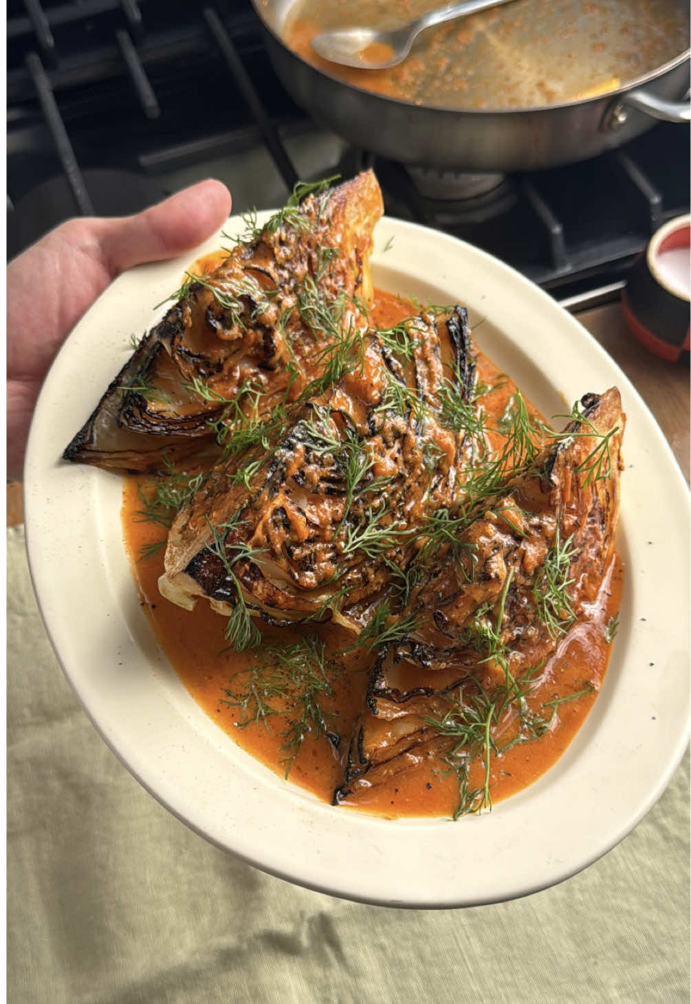 TikTok post by @cabagges for KerrygoldUSA. Caption reads: #ad Tomato butter charred cabbage with only the....