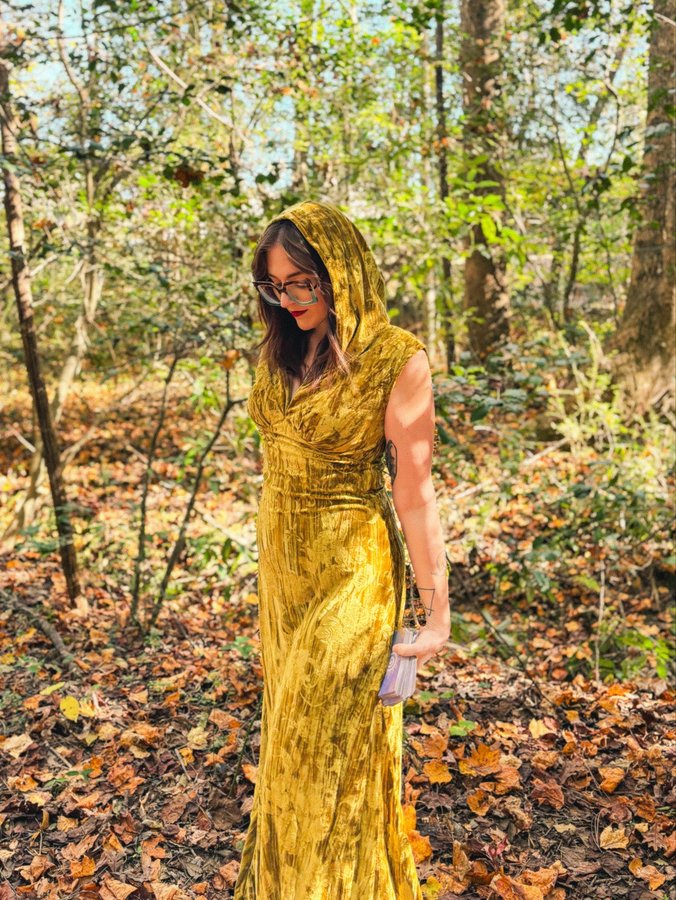 Instagram post by @enchantinglyerin_ for Unique Vintage. Caption reads: Embrace the magic of the season with....