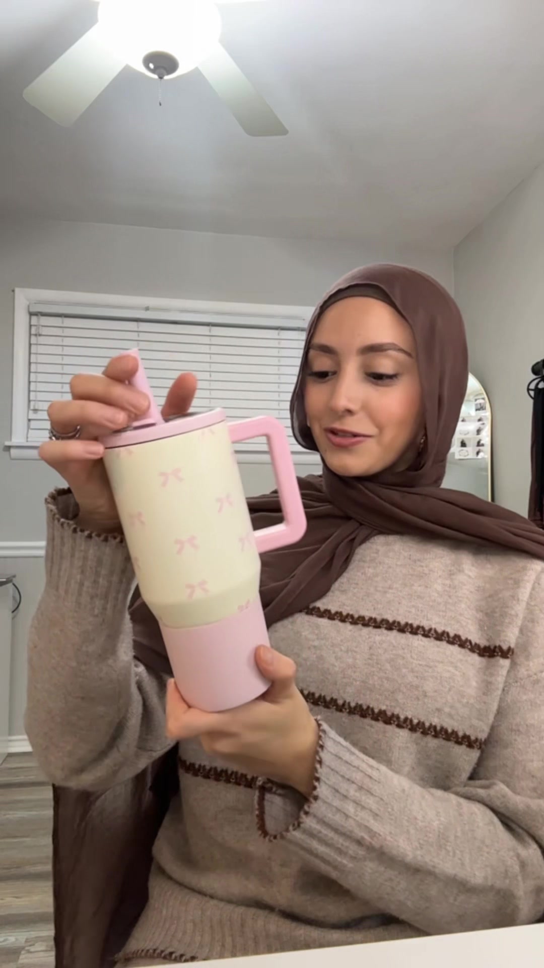 TikTok post by @karam_daniah for HYDROJUG. Caption reads: Everything is cuter when it’s pink 🎀 @HYDROJUG....