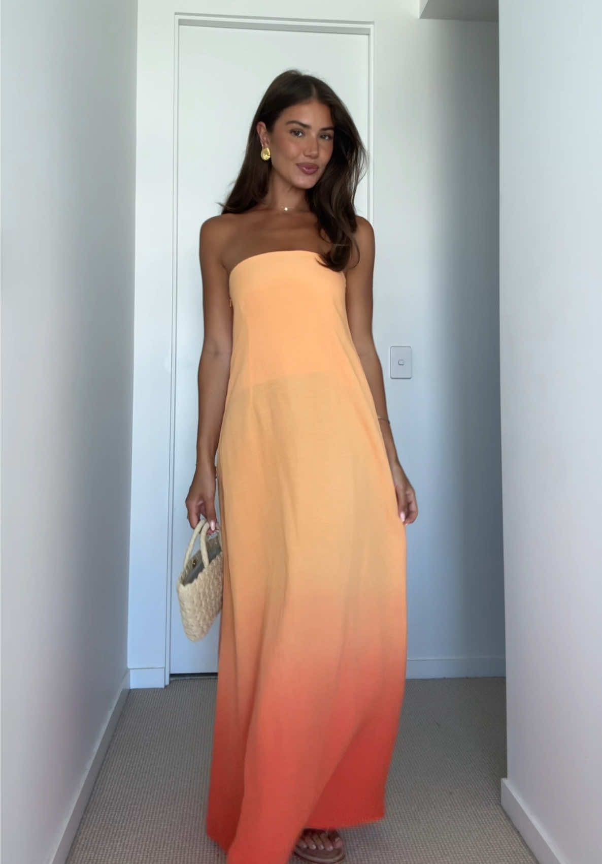 TikTok post by @dekotathompson for Mister Zimi. Caption reads: The perfect Summer dress @Mister Zimi 🧡.