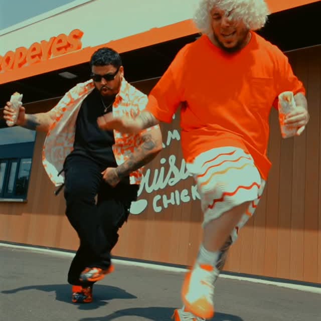 Instagram post by @mrminelli for Popeyes. Caption reads: #PopeyesPartner Wrap it up! Popeyes has wraps now,....