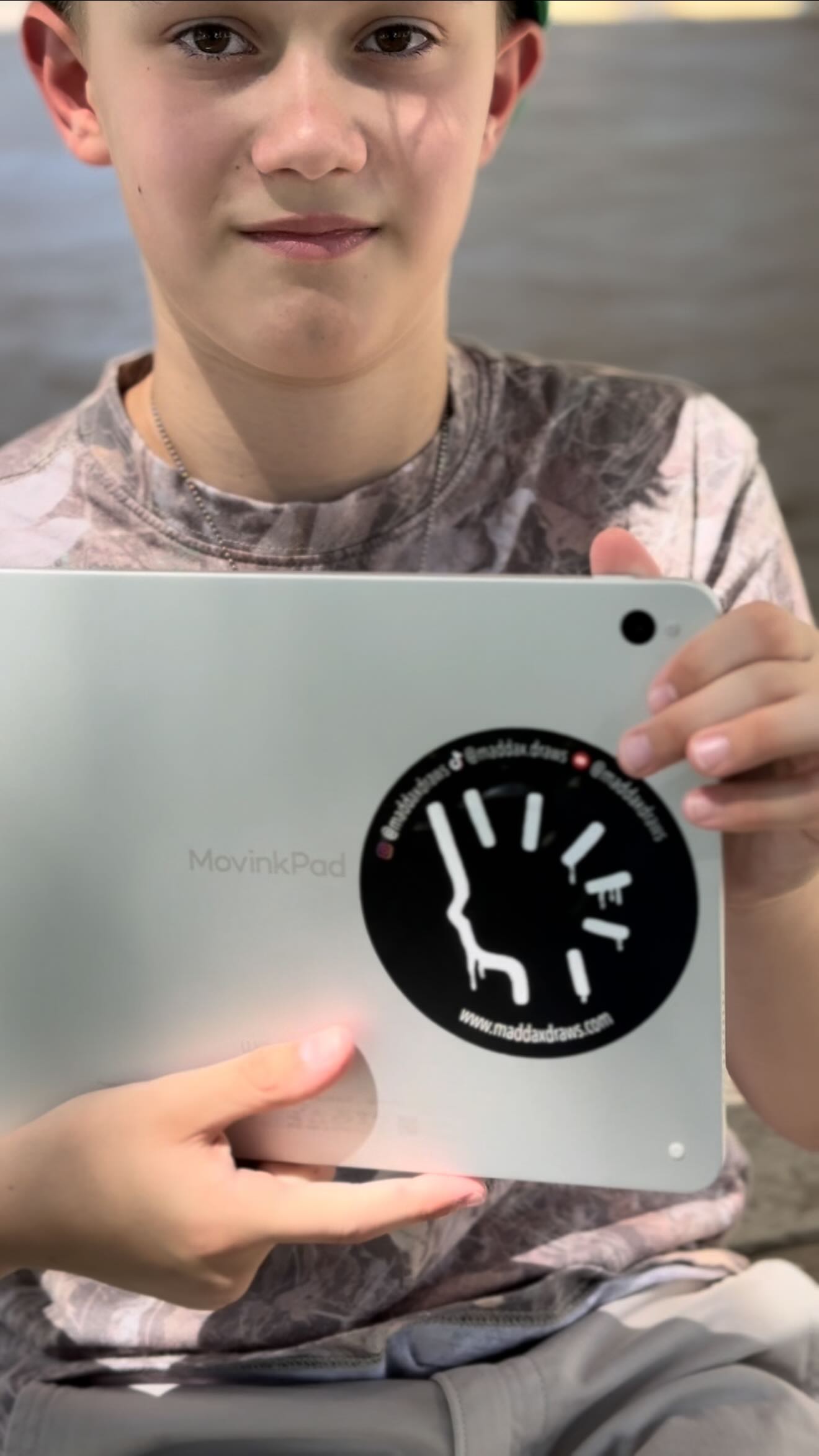 Instagram post by @maddaxdraws for Wacom. Caption reads: At the park or on the go, I am loving being able....