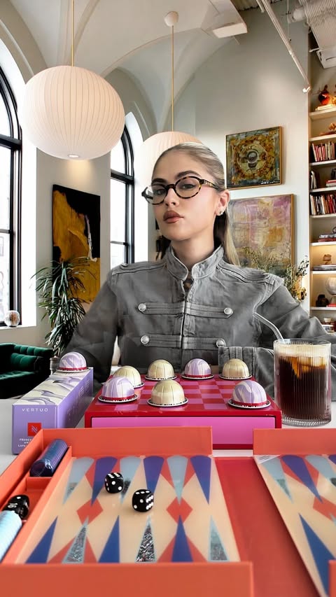 Instagram post by @lizzi.jpg for Nespresso. Caption reads: [...] coffee possibilities to explore with....