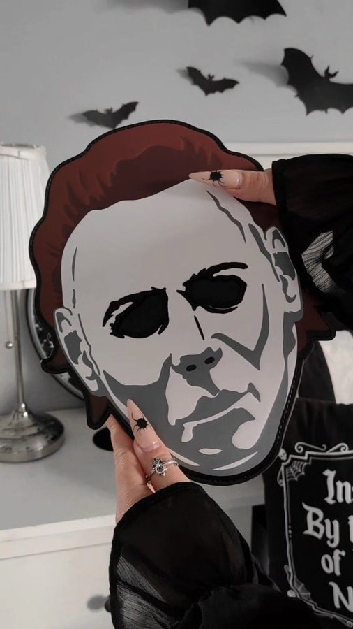 Instagram post by @_mystic_moon_witch for loungefly. Caption reads: [...] 𝔠𝔥𝔞𝔰𝔢 𝔪𝔢 👀🖤
.
.
🌿 GIFTED....