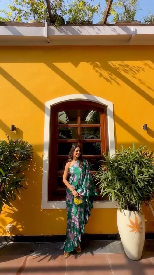 Instagram post by @arushi.mehra_ for Mac Duggal. Caption reads: Saying hello to spring in @macduggal! ☀️ This....