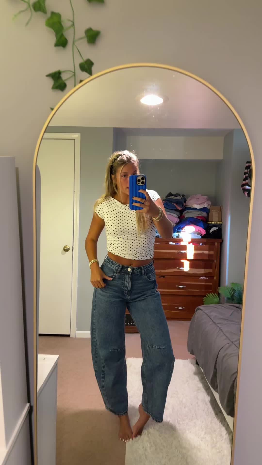 TikTok post by @breanna_campbell for Vogatiques. Caption reads: i'm obsessed with these jeans!! @Vogatiques 💖💖....