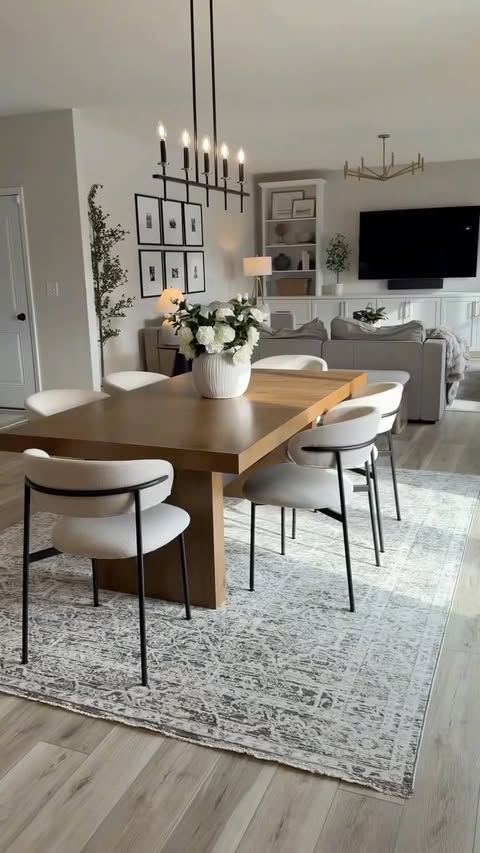 Instagram post by @amandabhome for Loloi. Caption reads: [...] refreshed our dining room with this new....