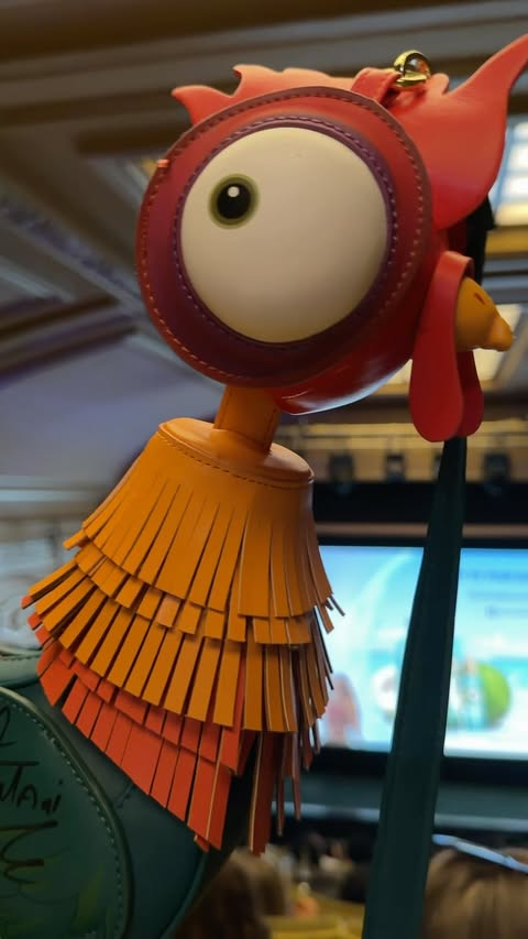Instagram post by @happilykatherine for Walt Disney Studios. Caption reads: AD/PR WHERE IS HEI HEI GOING? Hei Hei went on an....