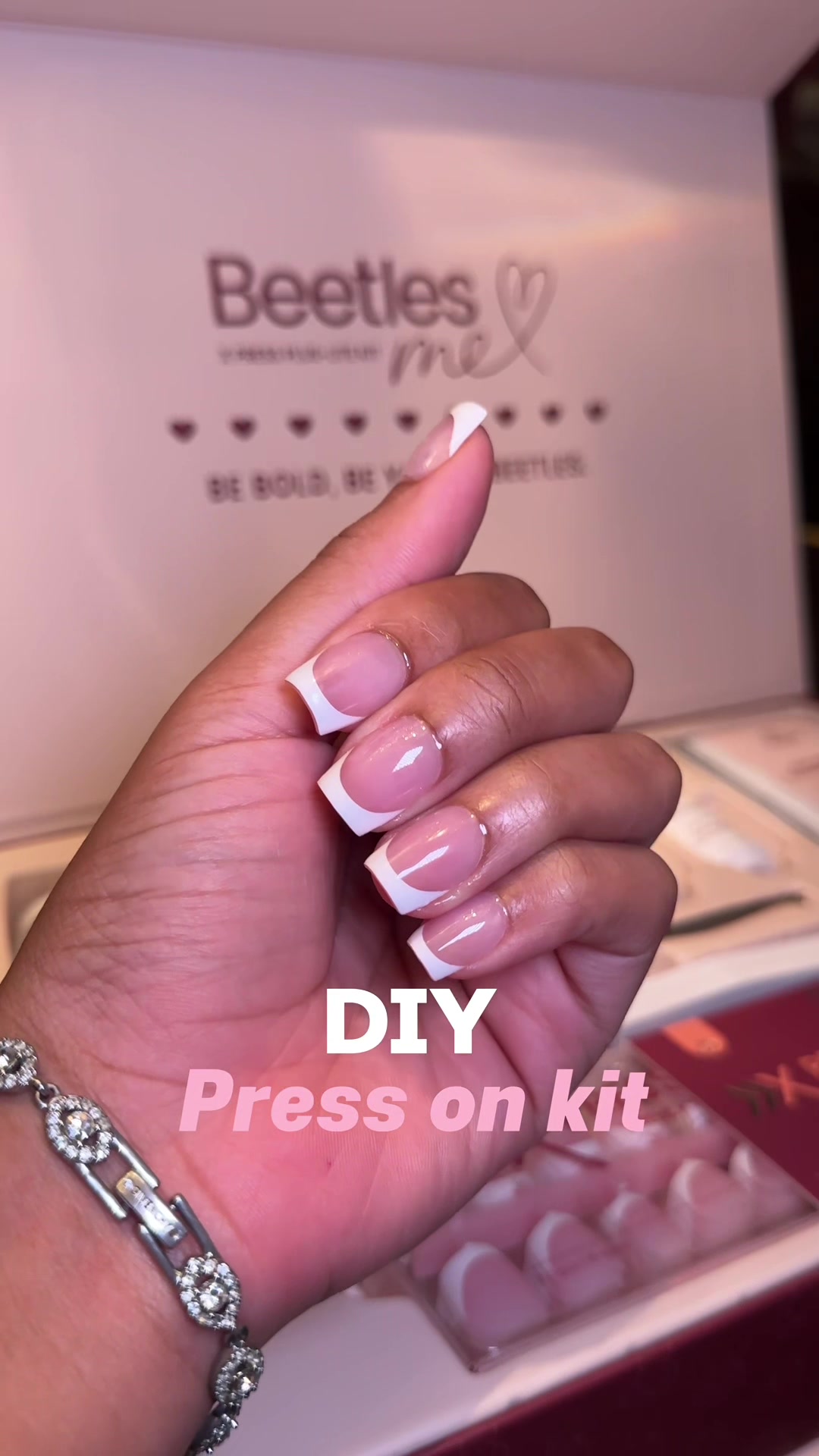 TikTok post by @itsbiancaabby for BeetlesGelPolish. Caption reads: [...] French tip nails at home 💅🏽😍....