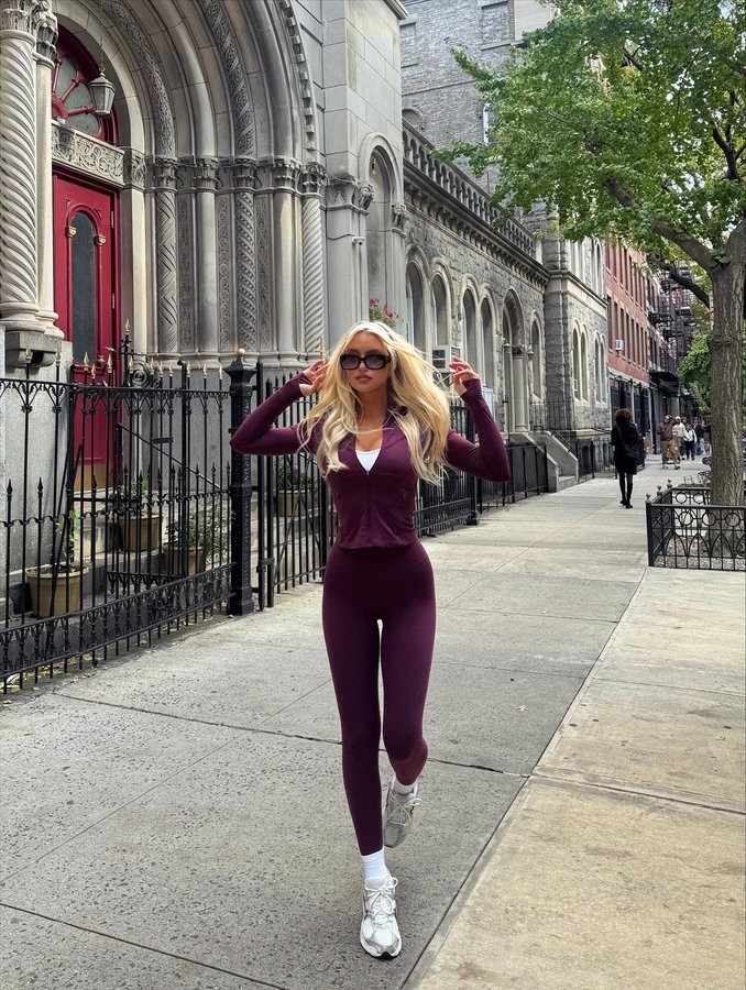 Instagram post by @marissaayerss for Elite Eleven Sporting. Caption reads: this plum workout set is everything to me <3 Join....