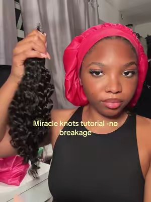 TikTok post by @23milss for OQ HAIR WIG. Caption reads: [...] curly crochet hair miracle knots from @OQ....