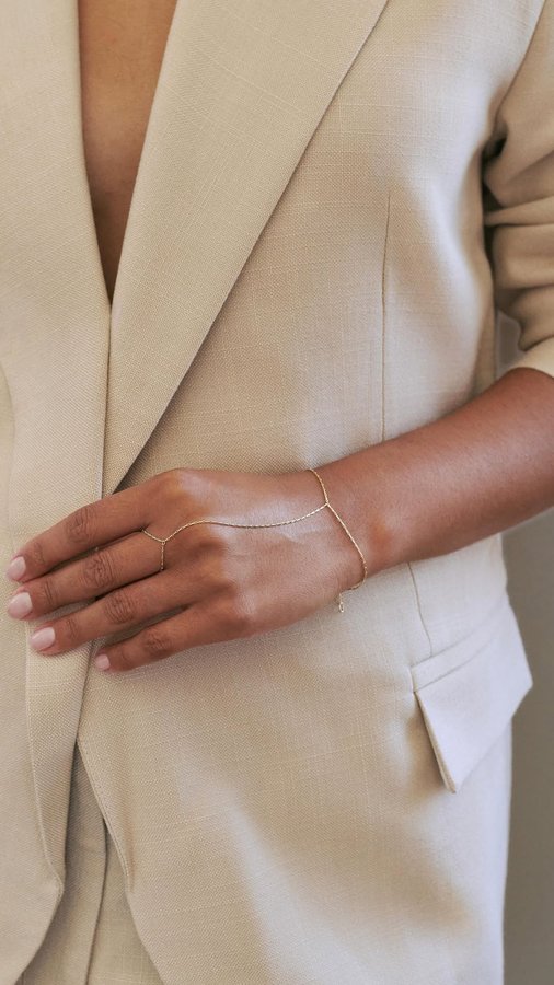 Instagram post by @iramshelton for Edge of Ember. Caption reads: [...] Hand chain is now available online at....