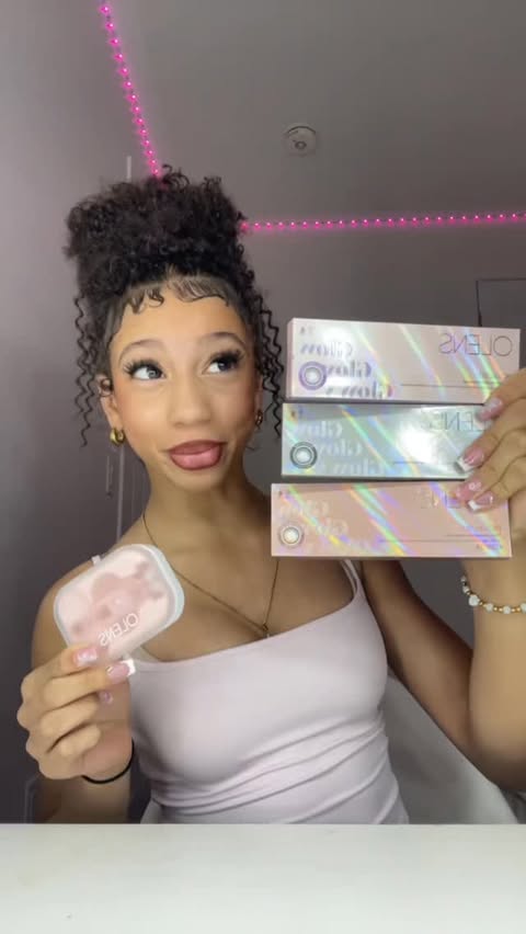 Instagram post by @lifewithhaaliyah for OLENS official (EN). Caption reads: daily “Big Glowy” lenses from @olens_contactlens....