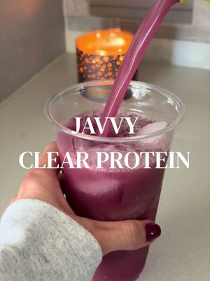 TikTok post by @megkauffman for Javy Coffee. Caption reads: DELISH 🍋🔥 a protein drink that actually tastes....