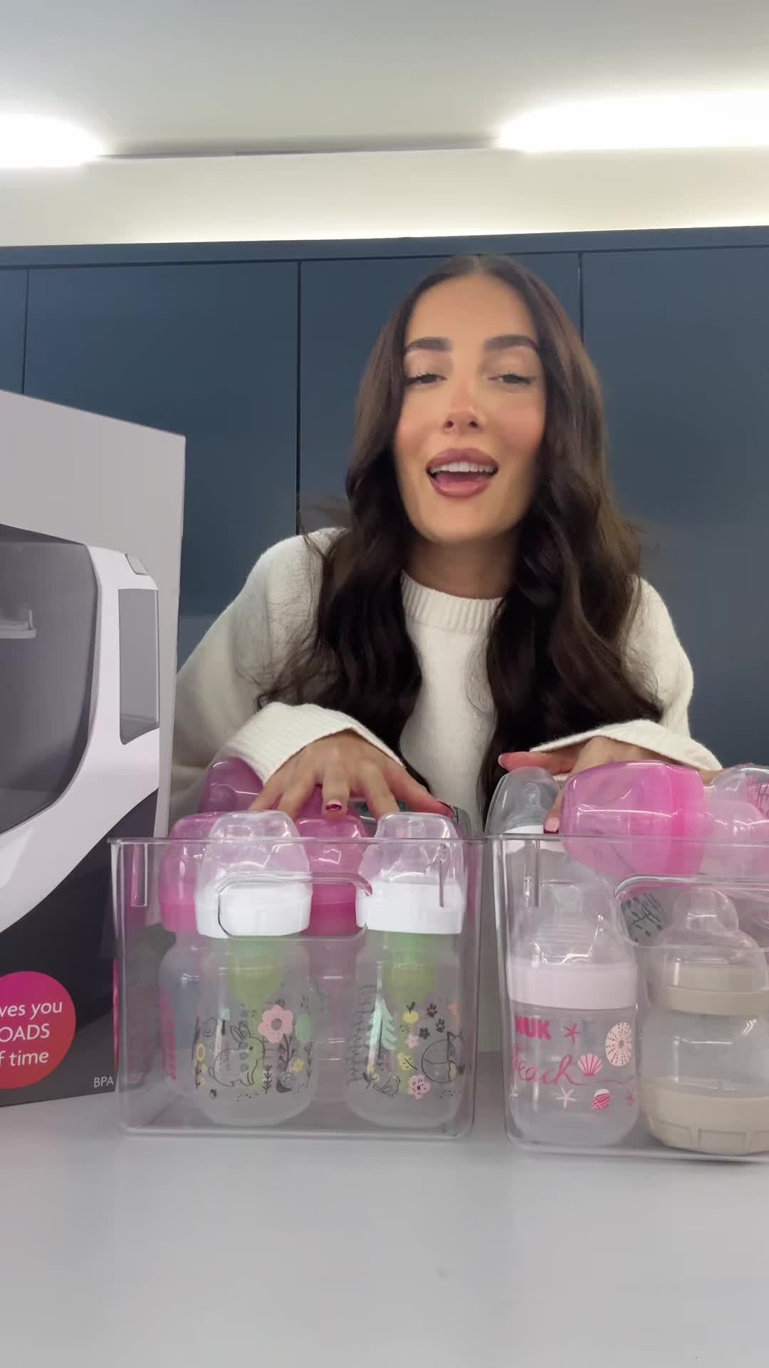 TikTok post by @harleighfairgriev for Baby Brezza. Caption reads: The nesting continues 🥹 unbox mg dreammm Mum....