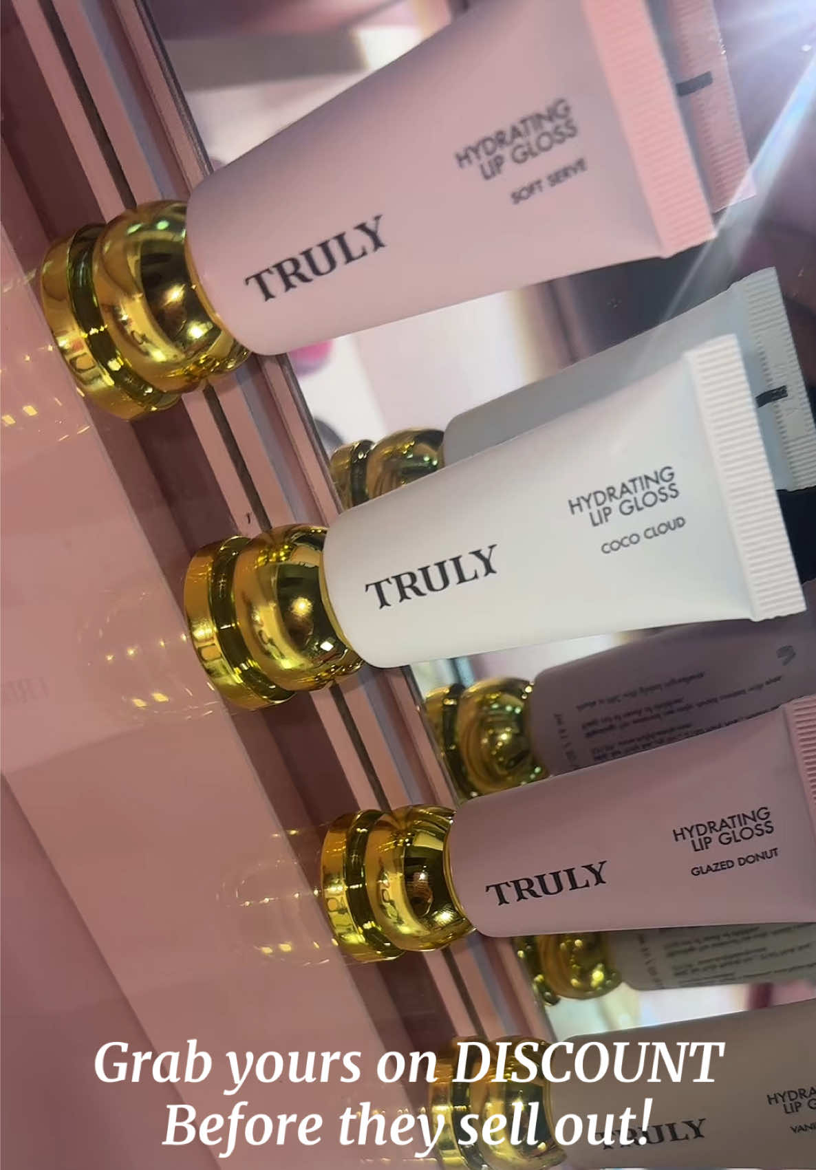 TikTok post by @j0j0baby_ for Truly Beauty. Caption reads: [...] #plumplips #lipgloss #trulybeauty....