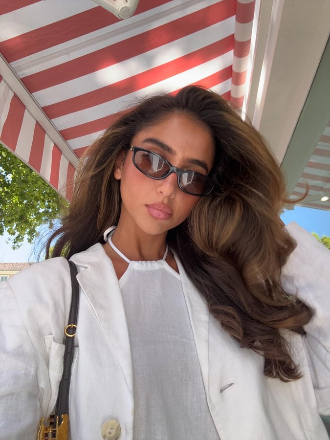 Instagram post by @dianashex for JIL SANDER. Caption reads: white linen on tan skin.